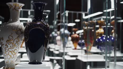 antique porcelain vases displayed in a museum