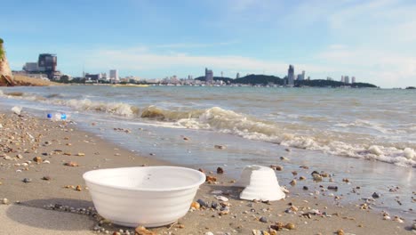 garbage plastic cup on the beach