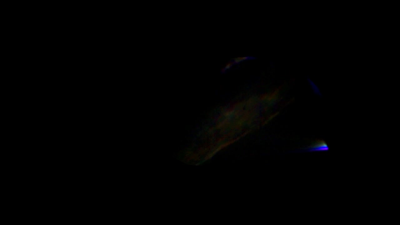 Abstract Light Leaks and Lens Flare Effects on Black Background