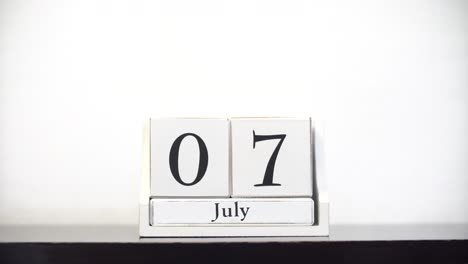 white calendar time lapse july