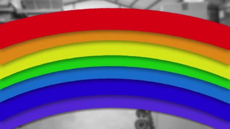 animation of rainbow over boxes in warehouse