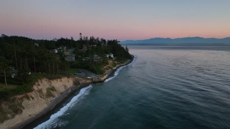 aerial view of libbey beach park and surrounding houses on whidbey island at sunset