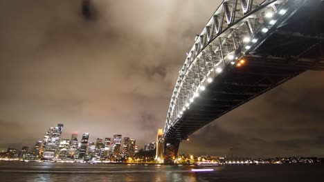 close view time lapse of the sydney harbour bridge at night.