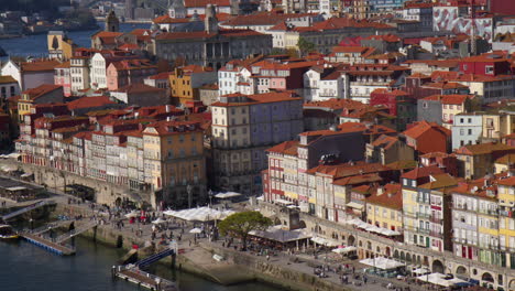 aerial view of riverfront city with busy streets at porto, portugal.