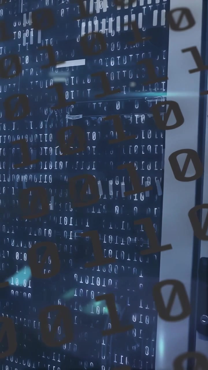 Vertical video: Camera panning right down, revealing rack behind binary decal to showcase hardware