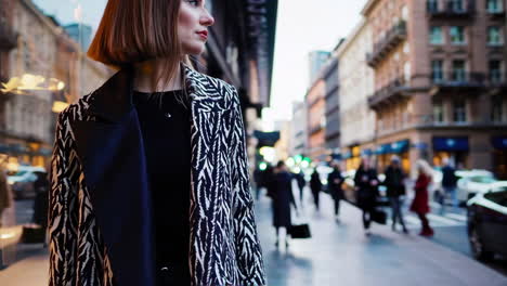 woman wearing zebra print coat in the city