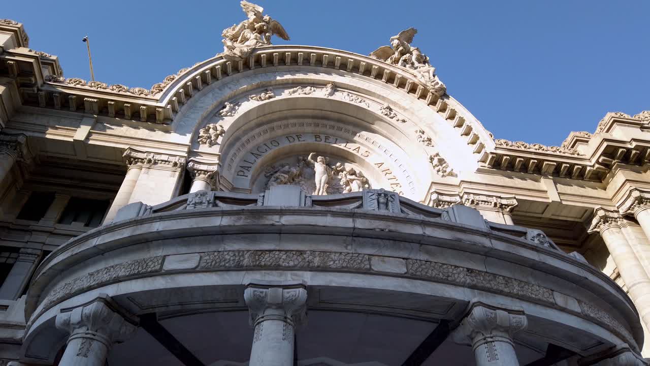 Majestic building facade in Mexico City under clear blue sky