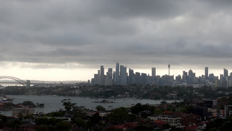 overcast skyline view of a metropolitan city with iconic bridge and tower: a blend of urban architecture and gloomy weather
