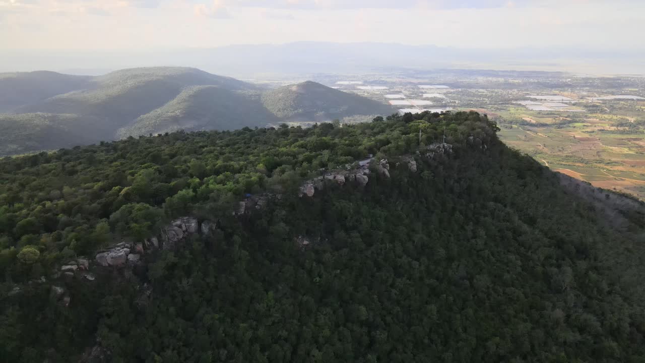 Aerial Drone Footage of Khao Phraya Doenthong Viewpoint Along Cliffs moving forward in Lopburi Province, Thailand.