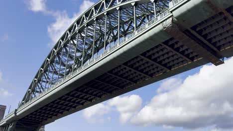 view of newcastle tyne bridge from below on the quayside - newcastle upon tyne, england
