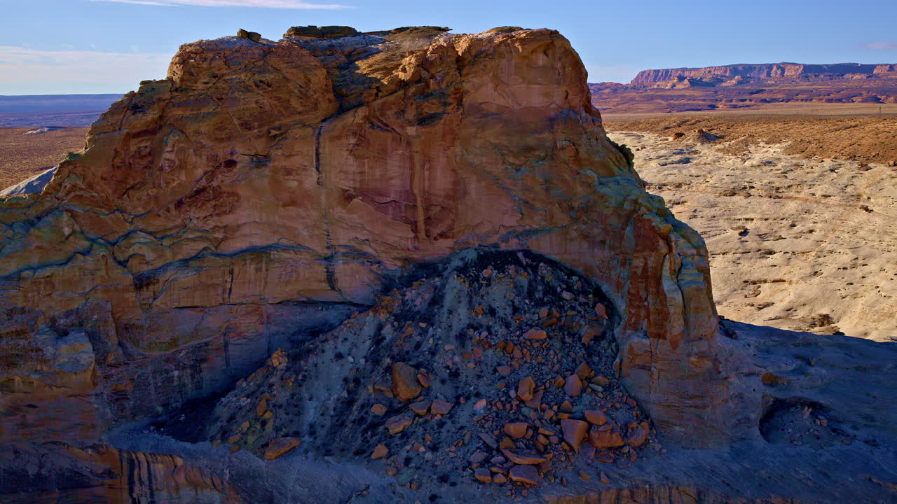 A drone glides over the surreal terrain of the American Southwest, bursting with vibrant shapes and colors.