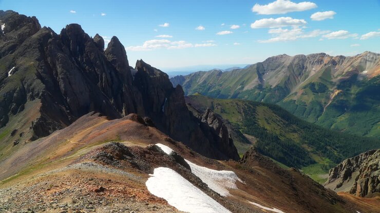 Southern Colorado summer snowy dreamy Rocky Mountains San Juan top of peaks Ice Lake Basin Trail toward Silverton Telluride Ouray Red Mountain Molas Pass top of the world slow pan still movement