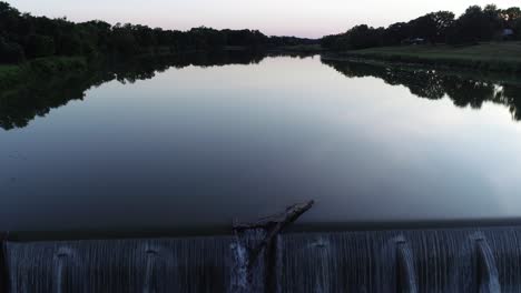 Aerial-drone-video-of-a-dam-on-the-Pedernales-River-at-dusk