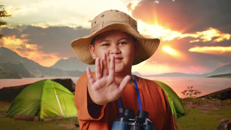 young boy on a camping trip