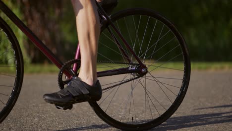 Cyclist-in-helmet-starting-his-ride,-Close-Up