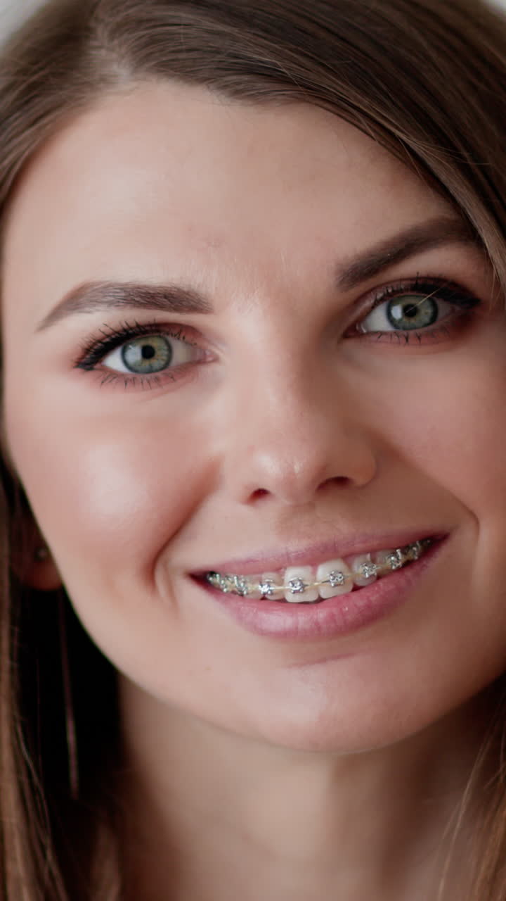 Woman with braces smiling