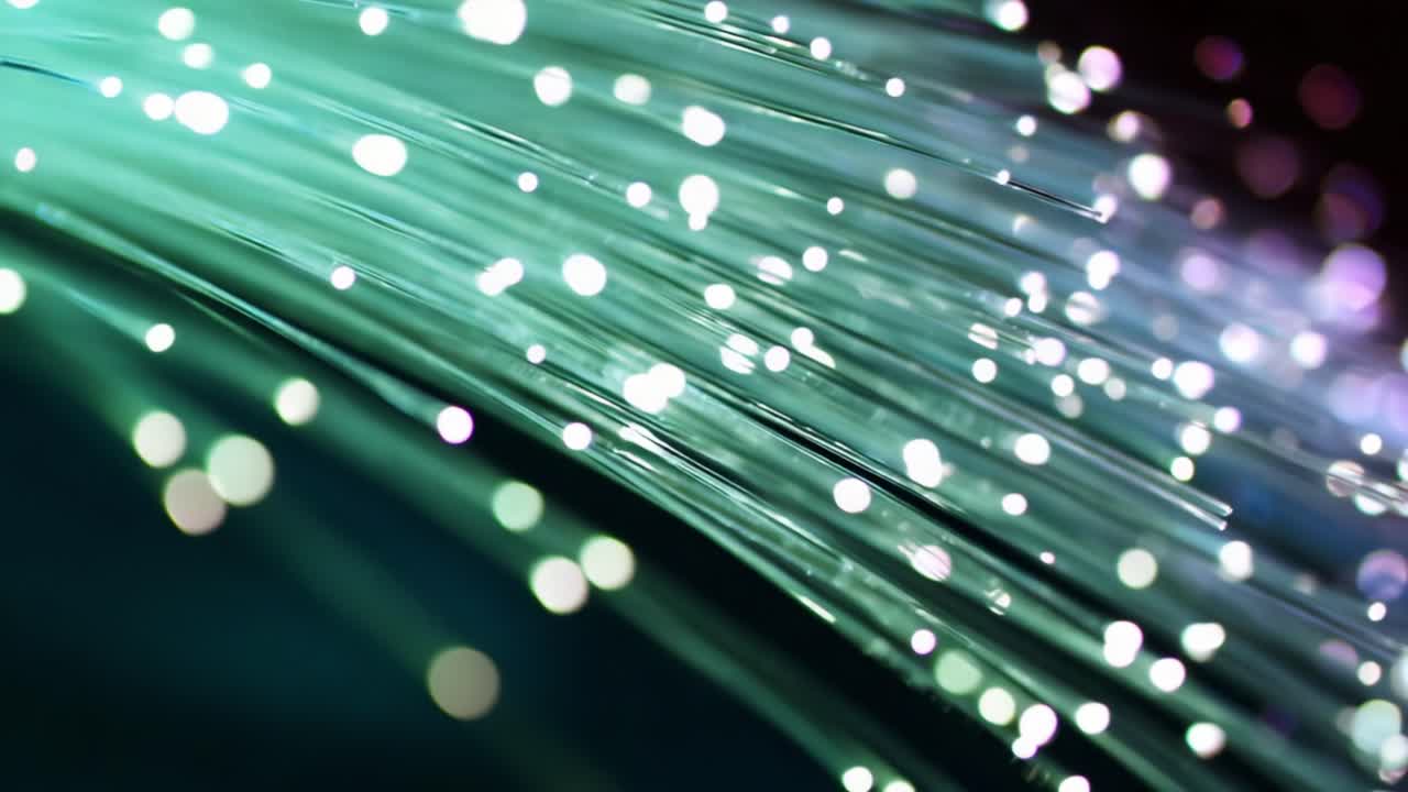 Dynamic Flow of Light: A Vivid Exploration of Fiber Optic Illumination, Capturing the Mesmerizing Dance of Colors and Sparkling Blurs in a Fluid Motion of Technology