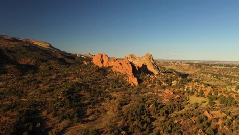 Garden-Of-The-Gods-Mountain-Valley-Sunset-Aerial-Pan-Shot-4K