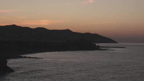 stunning time lapse video clear sky golden sunrise over coastal sea town on early summer morning