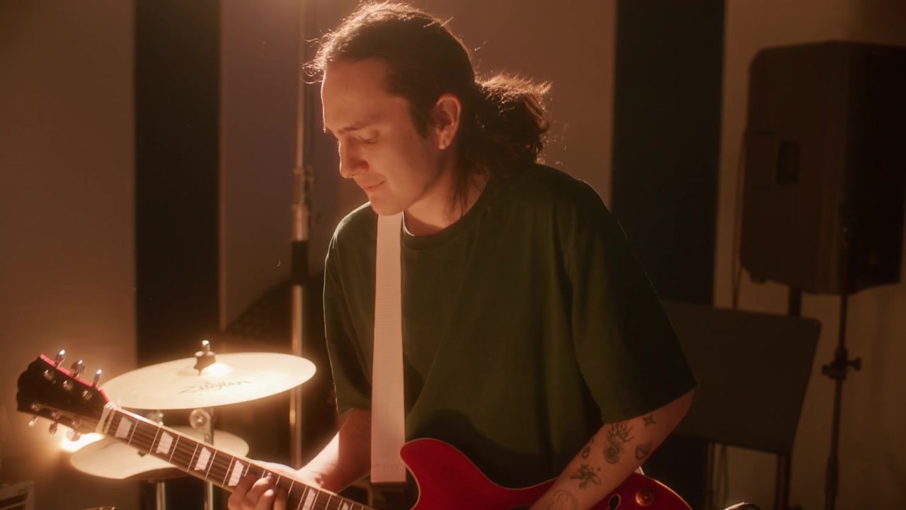 Diverse Group of Gen Z Musicians Jamming Together in Studio