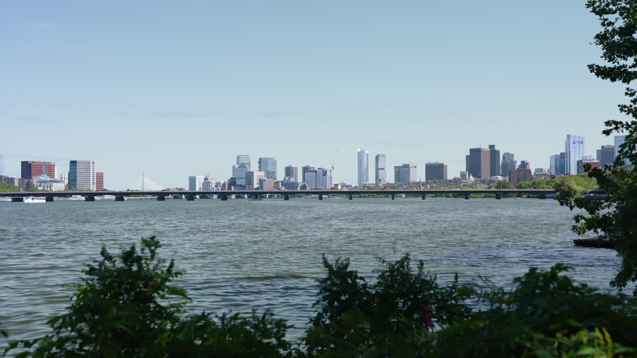 Boston City Skyline Over The Water At Daytime - Wide Shot