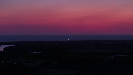 scenic red sky at twilight over zeeland in the netherlands