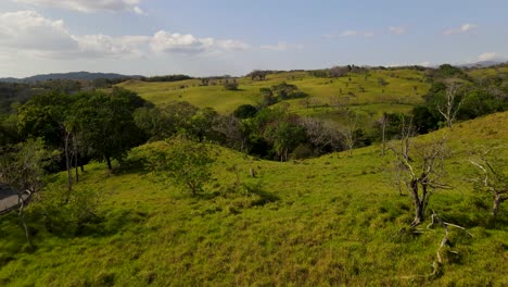 aerial drone footage lifting from extensive land, farming and rural landscapes, costa rica