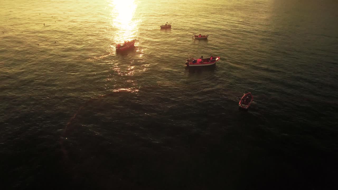 Fishing Boats at Sunset