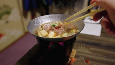 Japanese Sukiyaki, Hot Pot Cooked with Vegetables and Thin Strips of Meat