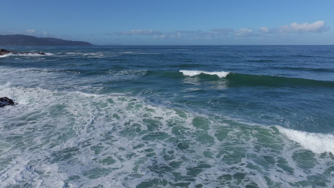 Sea Waves Onto Shores Near Praia da Salsa In Arteixo, A Coruña, Galicia, Spain. Aerial Drone Shot