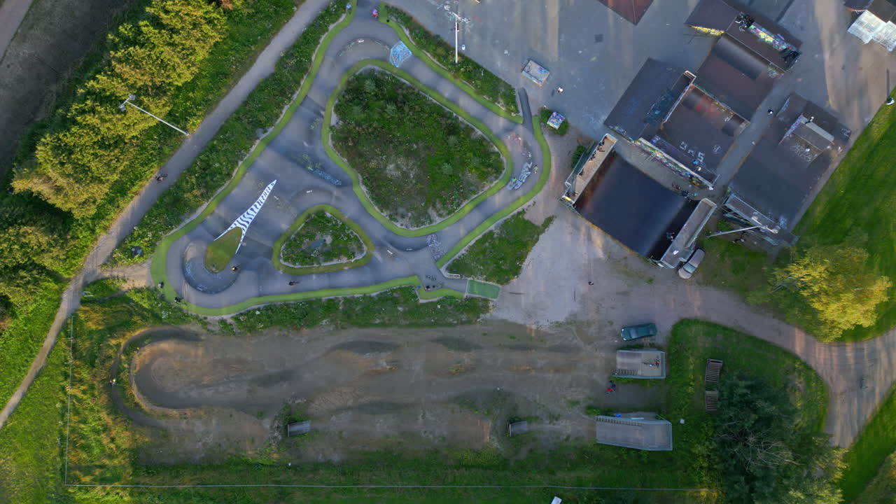 Extreme sports park in Helsinki, Finland with a vert ramp, pump track and a dirt bike trail