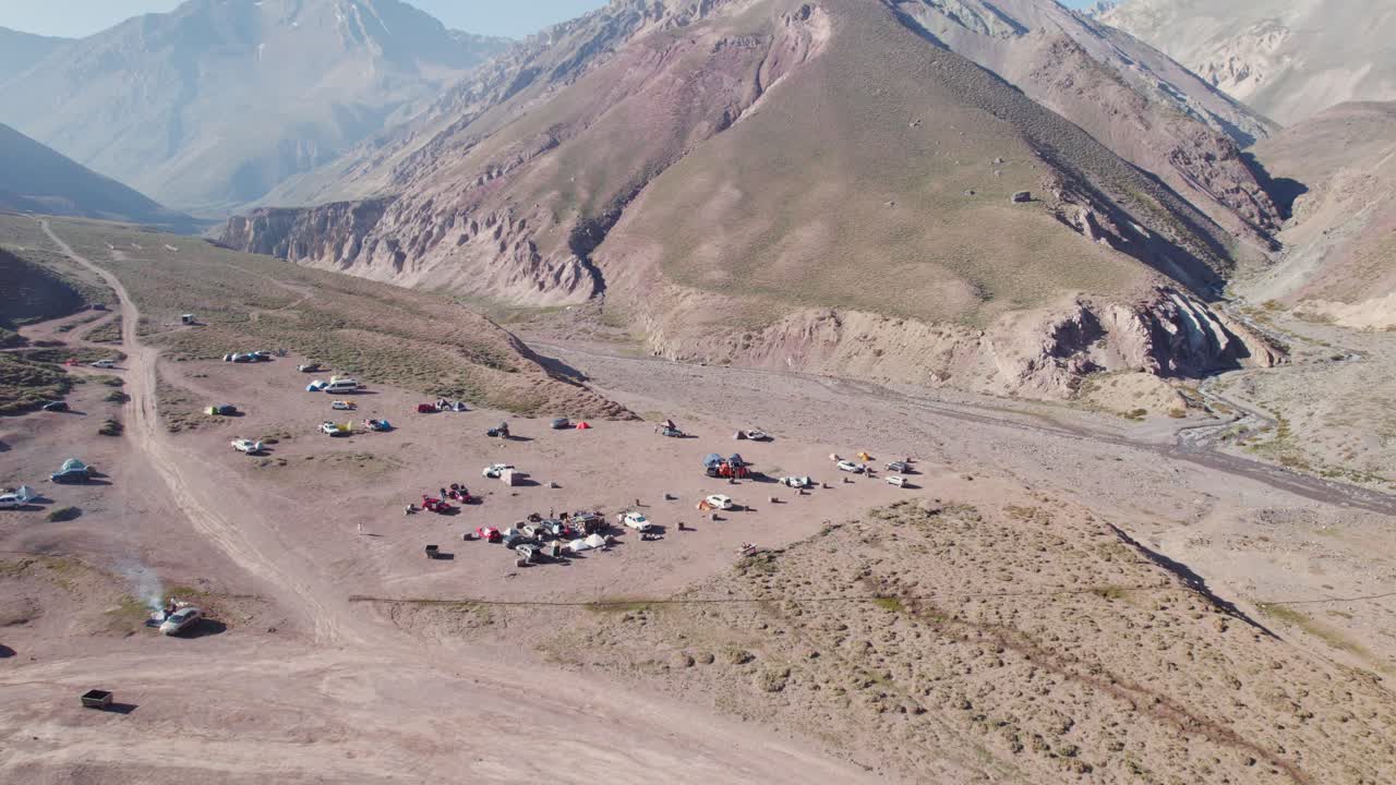 Vehicles And Tents At The Camping Area Of Termas Valle de Colina In The Chilean Andes