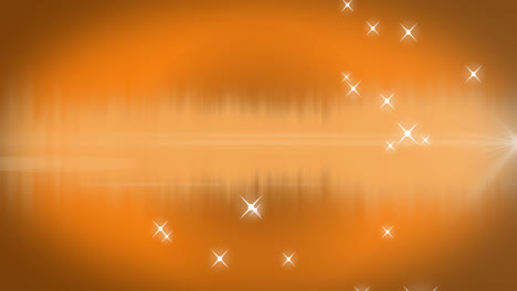 animation of glowing spots of light and twinkling stars moving in hypnotic motion on orange backgrou