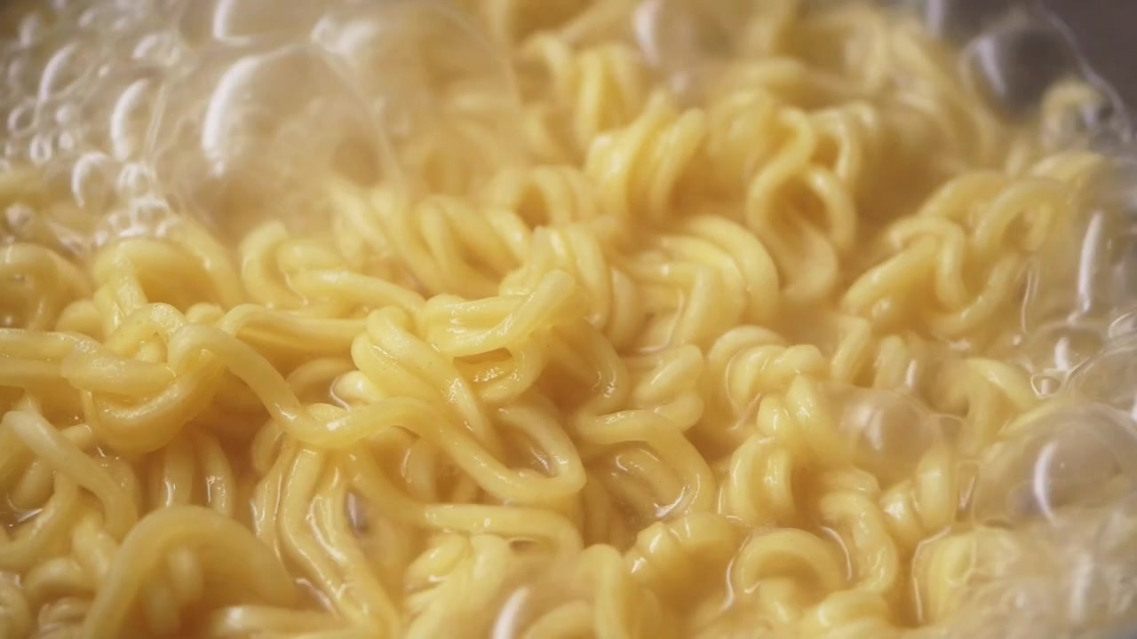 Instant Noodles Boiling in Hot Water