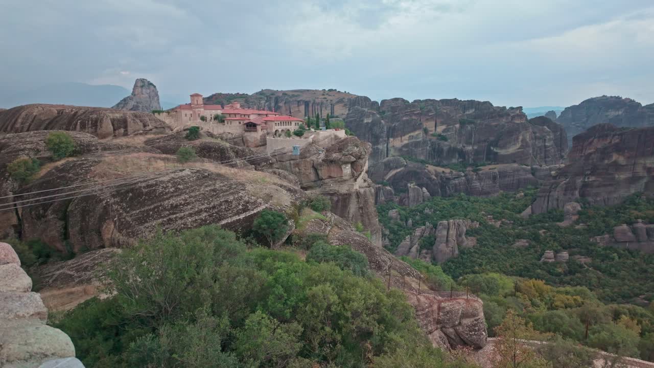 Cableway cradle transports tourists to Holy Trinity Monastery Meteora