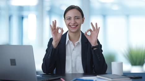 Happy-Indian-business-woman-showing-okay-sign