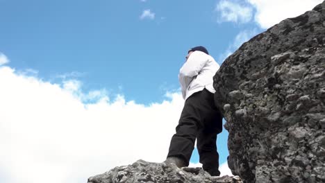 person standing on a mountaintop