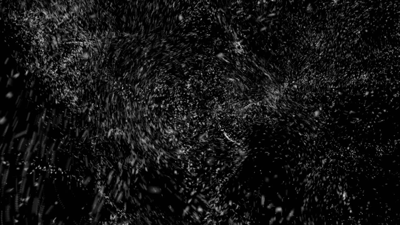 nieve cayendo sobre un fondo negro