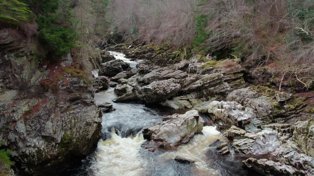 aerial view of wilderness waterfall stream of clear water in Findhorn village in Moray, Scotland