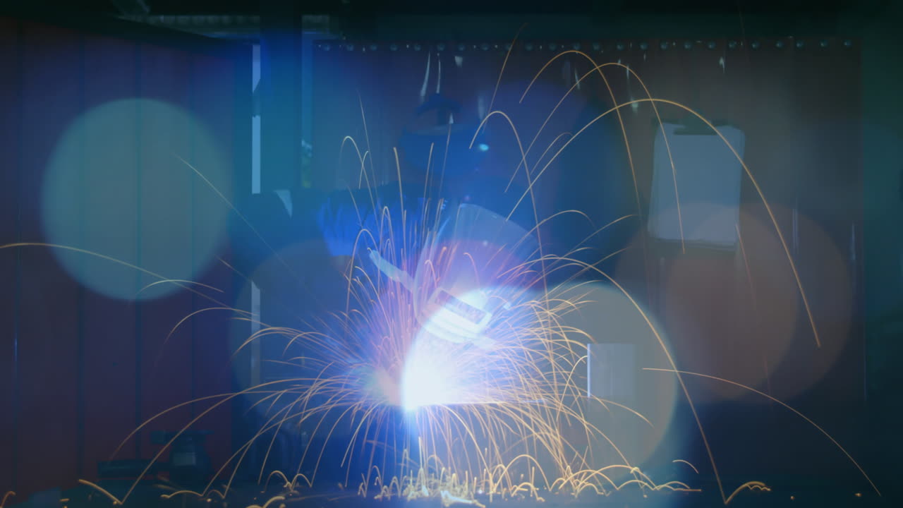 Welder and spots of light 4k