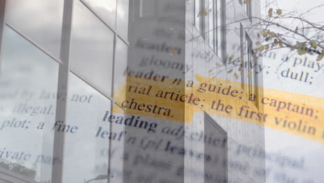 highlighted text animation over modern building with reflective glass windows