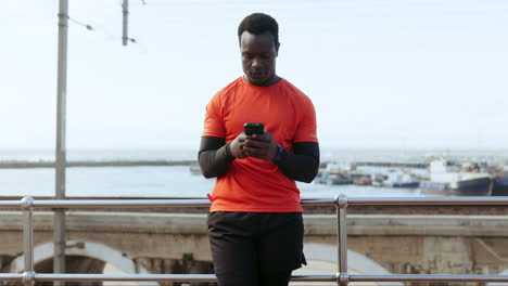 outdoor, exercise and black man with a cellphone