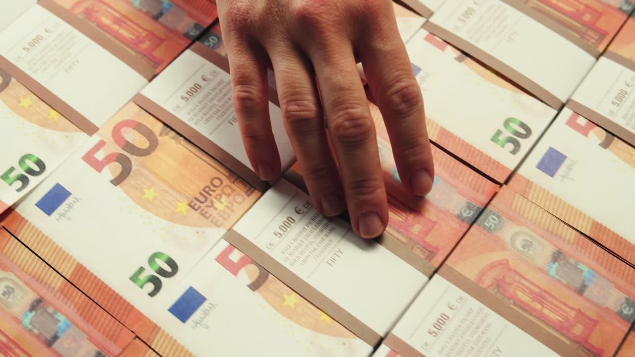 Stacks of cash dollars and euro, Banknotes counting, Specialised police officer Counting dollar euro banknotes in crime lab with machine, cashed out money, bitcoin changing, buying home flat in bank.