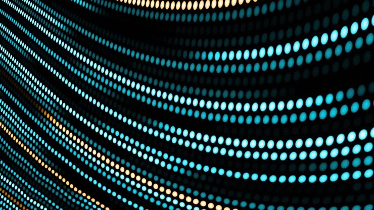 Animation of blue and yellow dotted light trails moving in hypnotic motion on seamless loop