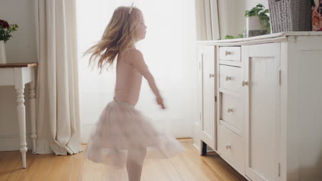 cute little girl dancing playfully pretending to be ballerina happy child having fun playing dress up wearing ballet costume at home 4k