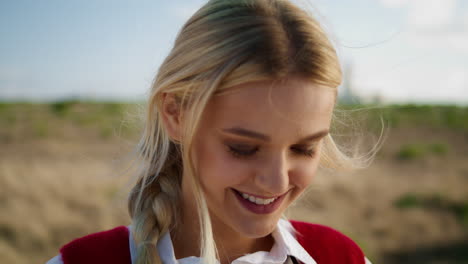 blonde woman shooting photos of landscapes closeup. pretty girl taking pictures