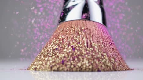 pink and gold glitter makeup brush