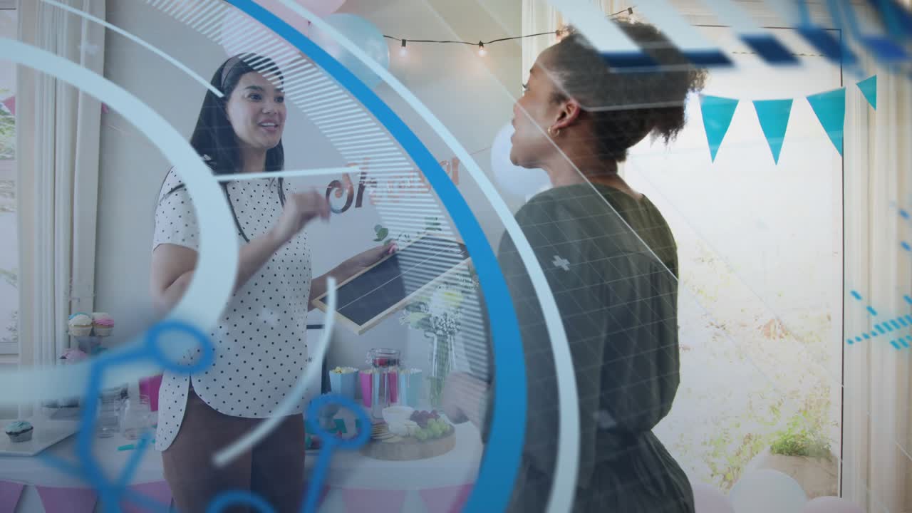 Left host writing sign right host inflating balloon prepping baby shower striped overlay sweeping