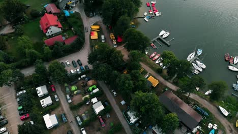 Aerial-shot-of-Wdzydzki-Park-Krajobrazowy-in-Kaszuby,-Poland-with-view-of-observation-tower-in-Wdzydze-Kiszewskie