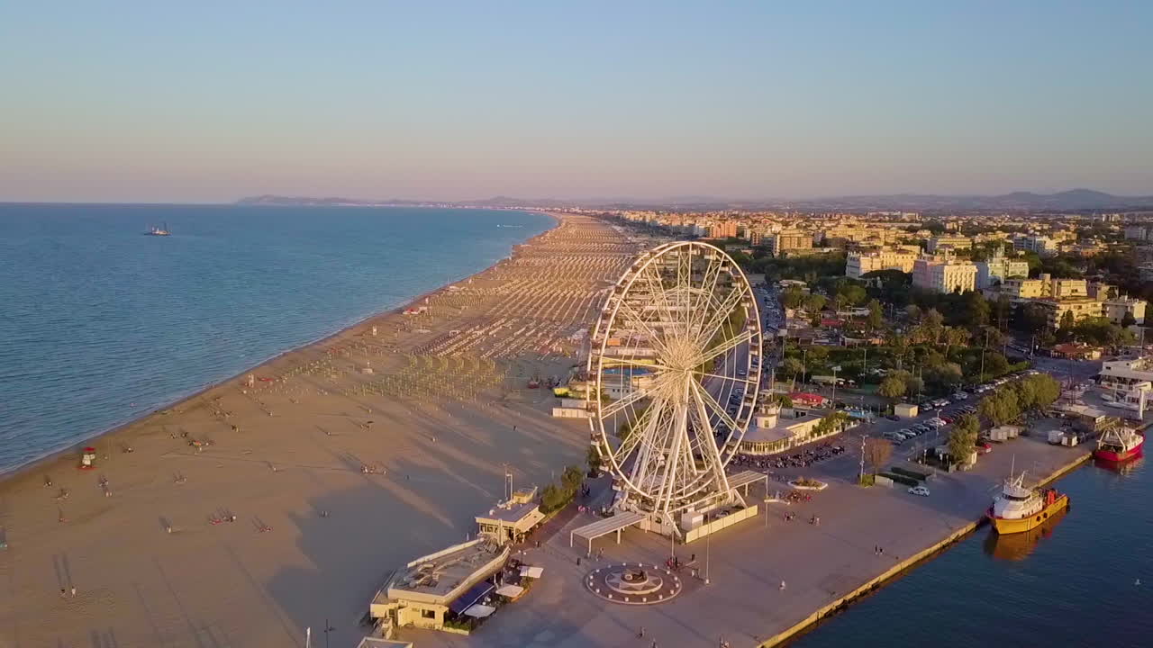 Ferris Wheel in Rimini Beach At Sunset - aerial shot